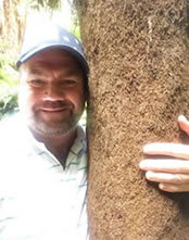 Gardening goose bumps hugging a Tree Fern Gardening goose bumps hugging a Tree Fern